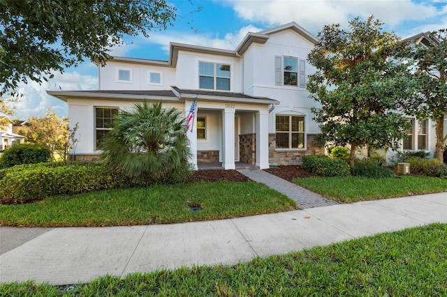 view of front of home featuring a front yard