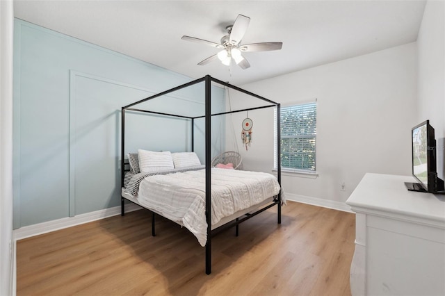 bedroom featuring ceiling fan and light wood-type flooring