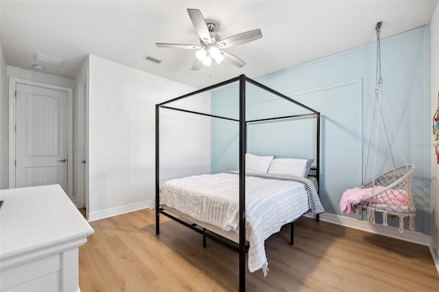 bedroom featuring ceiling fan and light wood-type flooring