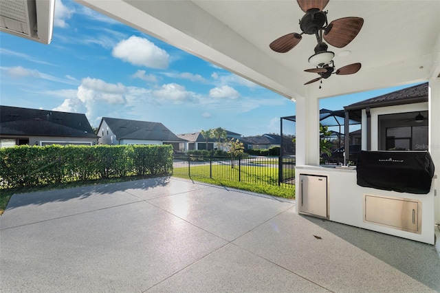 view of patio featuring ceiling fan