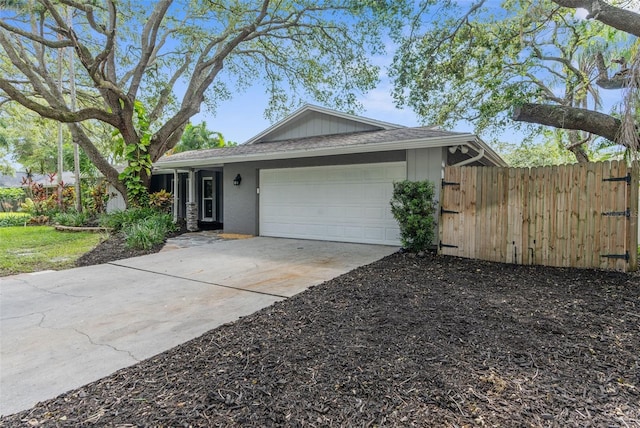 single story home with a garage