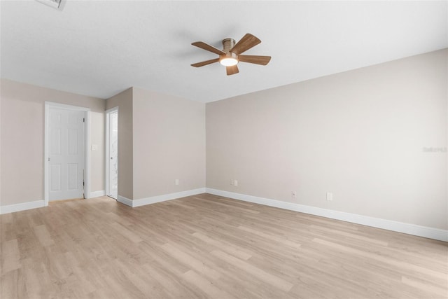 unfurnished room with light hardwood / wood-style floors and ceiling fan