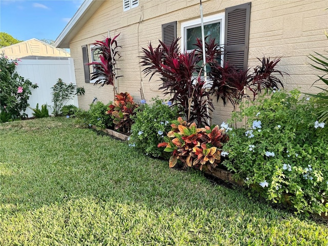 view of property exterior featuring a yard