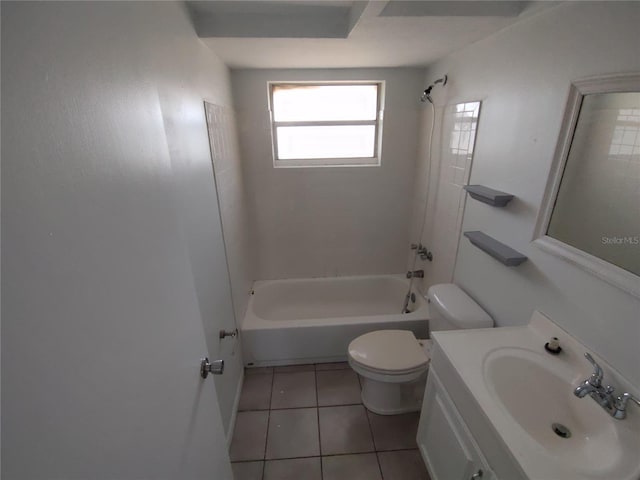 full bathroom featuring tile patterned flooring, vanity, toilet, and tiled shower / bath