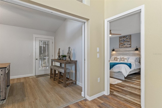 hallway featuring light hardwood / wood-style flooring