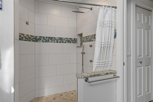 bathroom with curtained shower