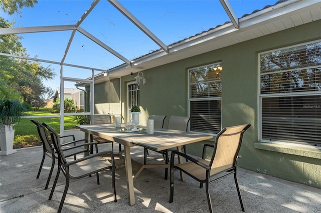 view of patio / terrace with glass enclosure