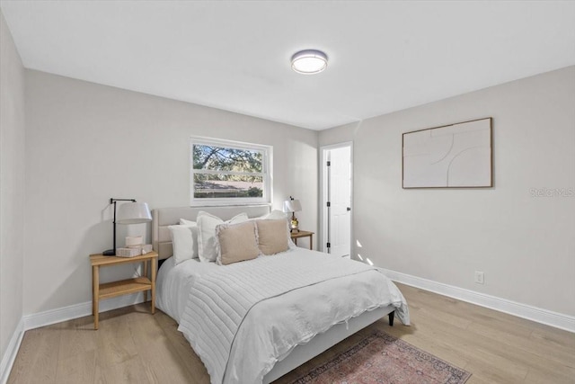 bedroom featuring light hardwood / wood-style floors