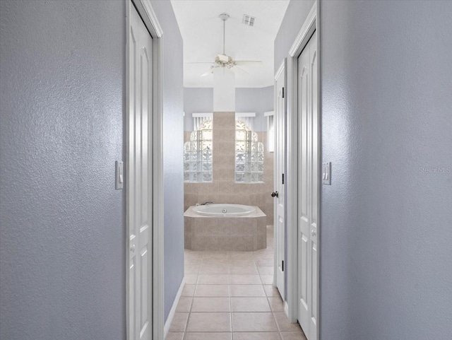 interior space featuring light tile patterned floors