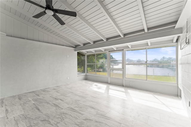 unfurnished sunroom featuring vaulted ceiling with beams, a water view, and ceiling fan