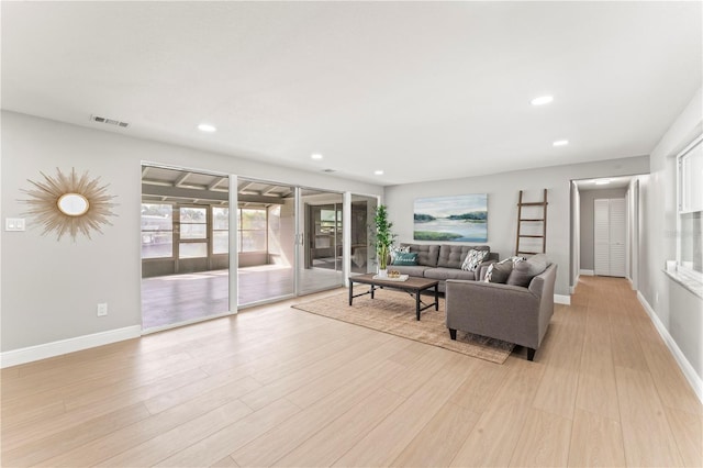 living room with light hardwood / wood-style floors