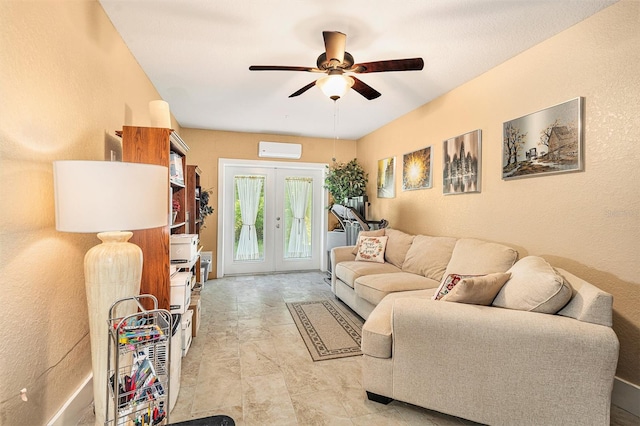 living room with ceiling fan, french doors, and a wall mounted air conditioner