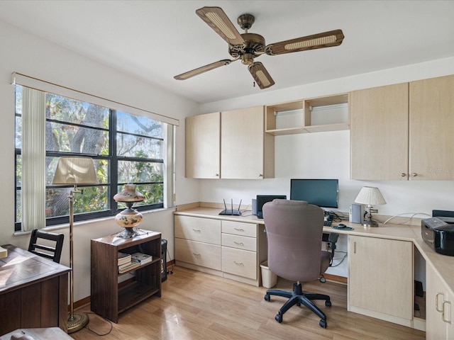 office with ceiling fan and light wood-type flooring