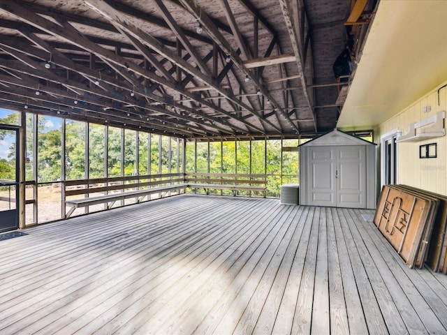 deck featuring a storage unit