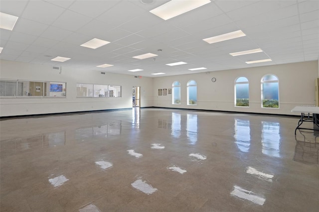 interior space featuring a paneled ceiling