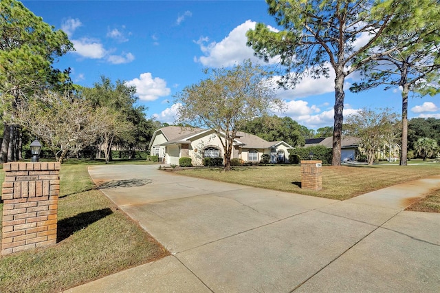 view of front of property with a front lawn