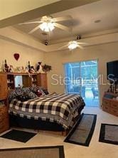 bedroom featuring ceiling fan