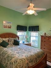 bedroom featuring ceiling fan