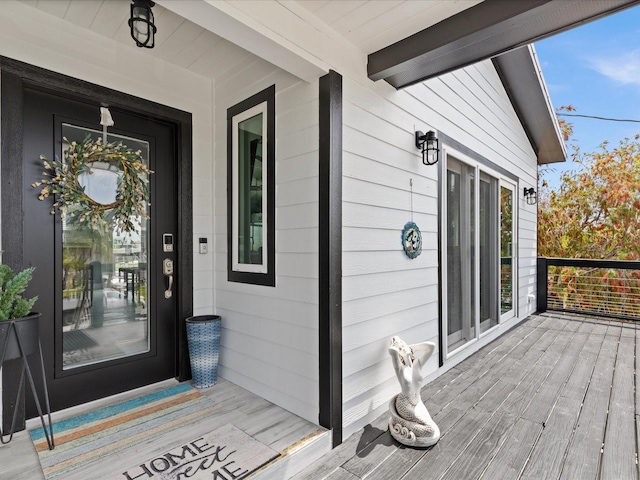 property entrance with covered porch