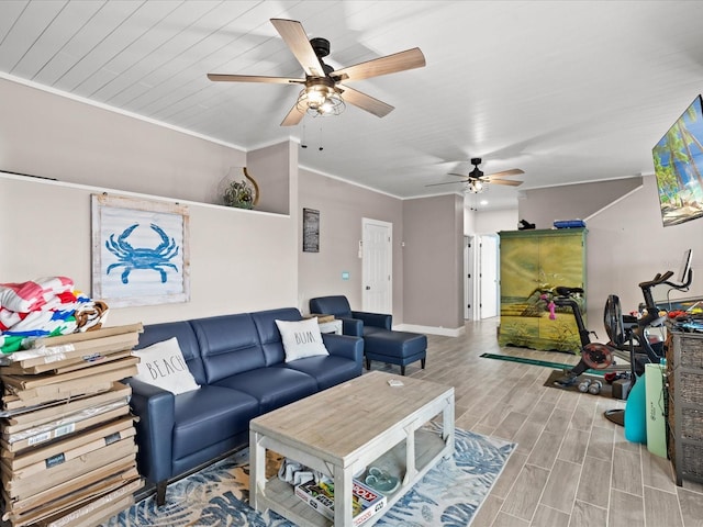 living room with light hardwood / wood-style flooring and crown molding