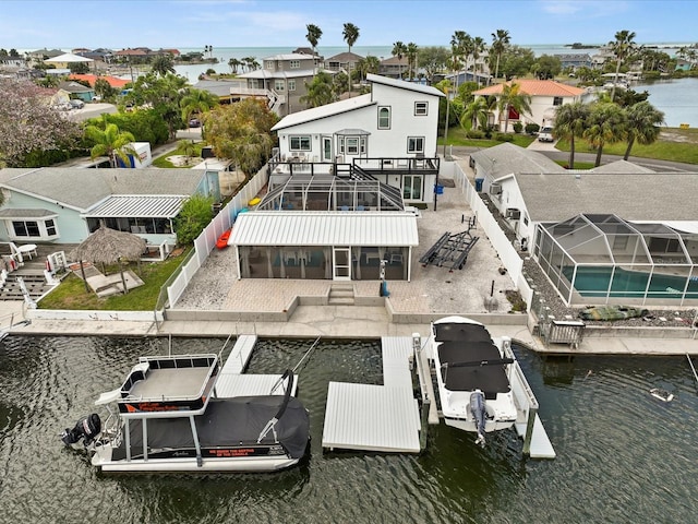 drone / aerial view with a water view