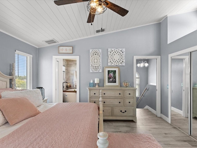 bedroom featuring ceiling fan, crown molding, lofted ceiling, wood ceiling, and light wood-type flooring