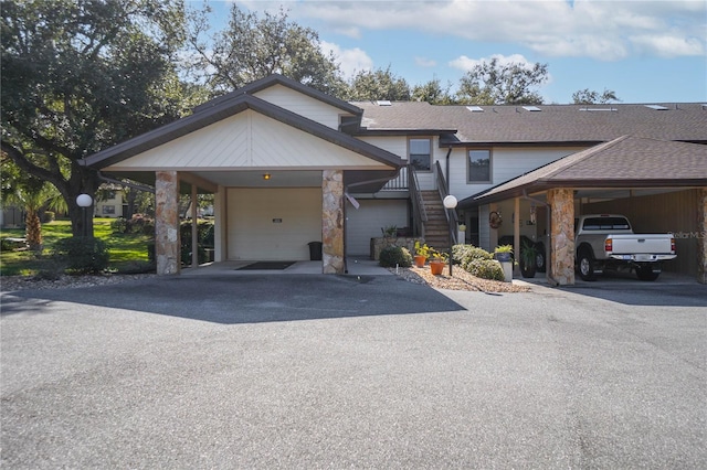 view of front of property with a carport