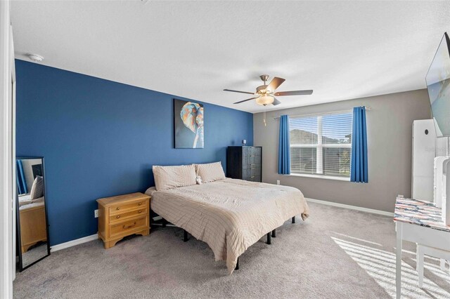 bedroom with carpet floors and ceiling fan