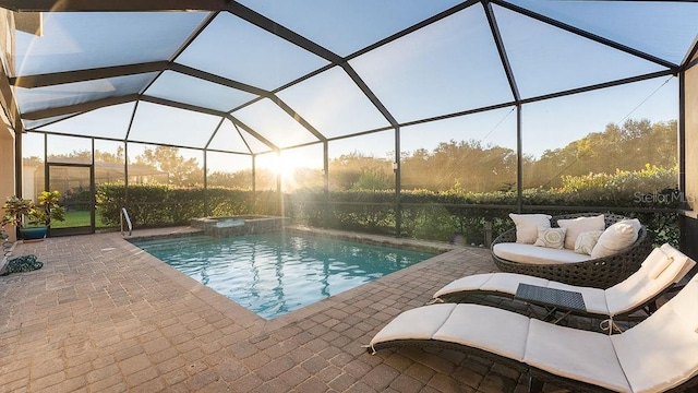 view of swimming pool featuring an outdoor hangout area, a lanai, and a patio area