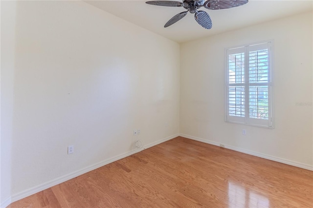 empty room featuring light hardwood / wood-style flooring and ceiling fan