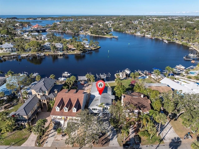 birds eye view of property featuring a water view