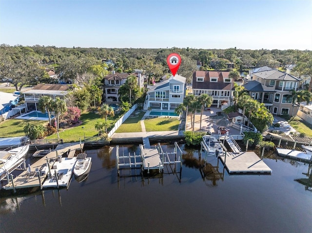 birds eye view of property featuring a water view