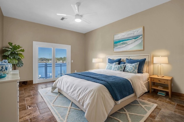 bedroom with ceiling fan and access to outside