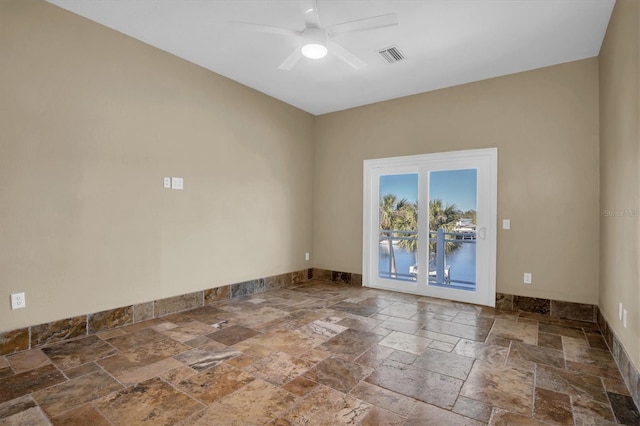 spare room featuring ceiling fan