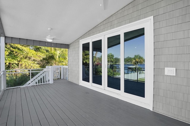 wooden deck with ceiling fan