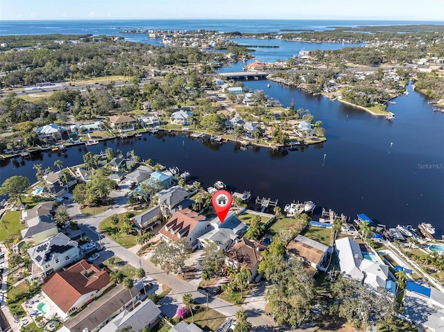 drone / aerial view with a water view