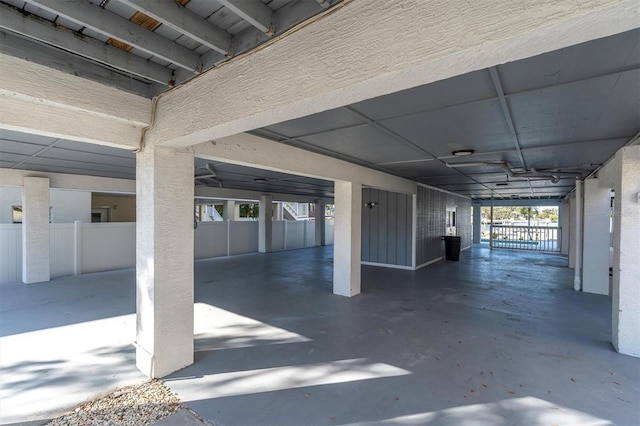 garage featuring a carport