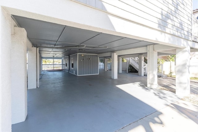 garage featuring a carport