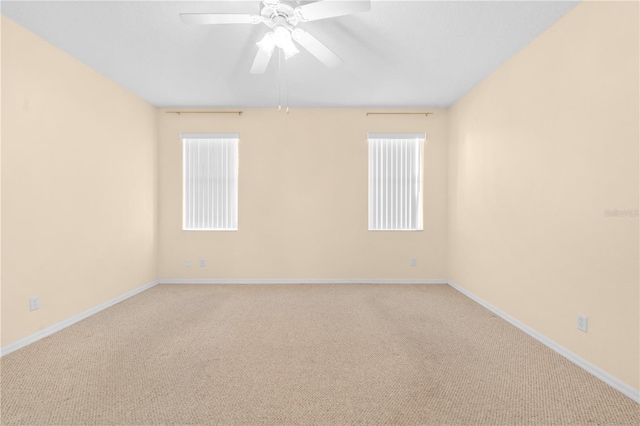4201 Silver Berry Ct, Spring Hill, FL 34609 - carpeted spare room with a ceiling fan and baseboards