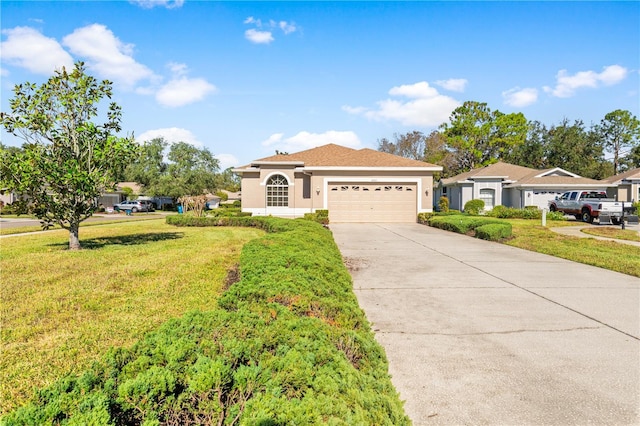 4201 Silver Berry Ct, Spring Hill, FL 34609 - mediterranean / spanish house with stucco siding, a garage, concrete driveway, and a front lawn
