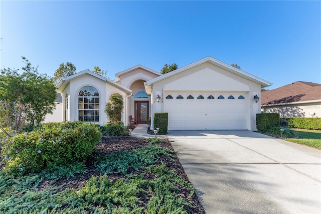 single story home featuring a garage