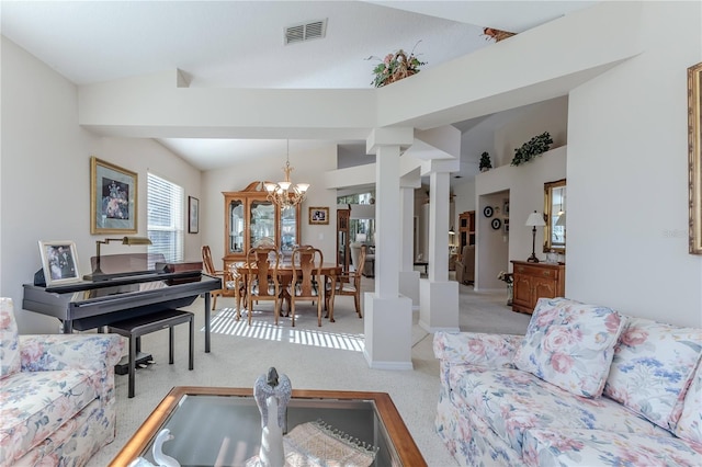 living room with light carpet and a notable chandelier