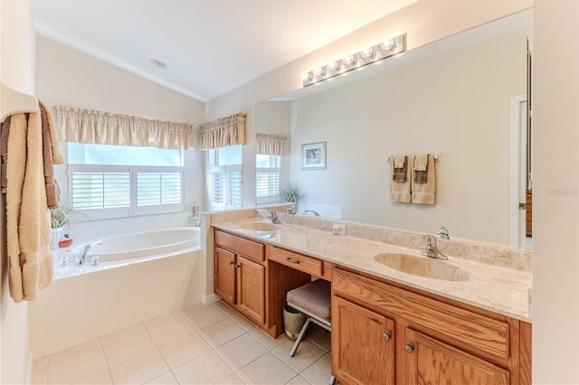 bathroom featuring tile patterned flooring, vanity, a relaxing tiled tub, and lofted ceiling