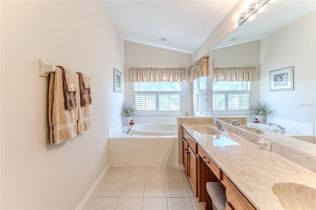 bathroom with tiled tub, tile patterned flooring, vanity, and lofted ceiling