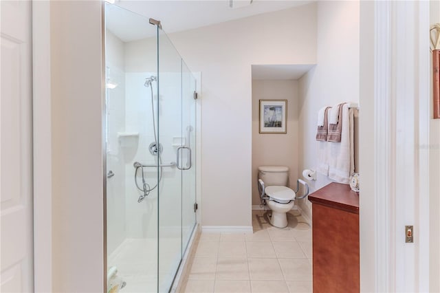 bathroom featuring tile patterned flooring, toilet, a shower with shower door, and lofted ceiling