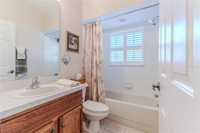 full bathroom featuring tile patterned flooring, vanity, shower / bath combo, and toilet