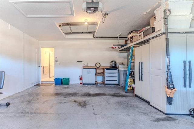 garage featuring a garage door opener