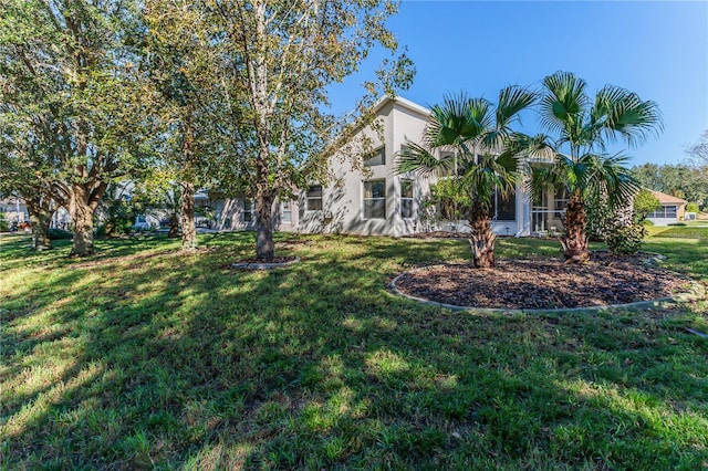 exterior space with a front lawn