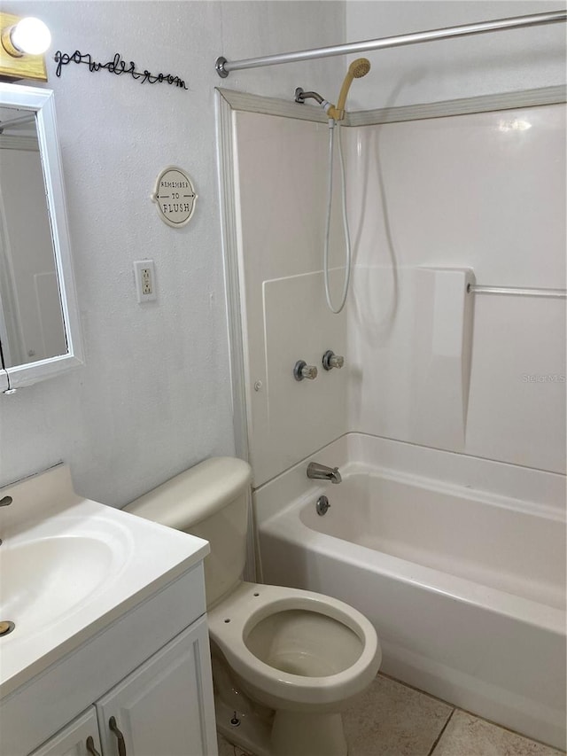 full bathroom with tile patterned flooring, vanity, tub / shower combination, and toilet