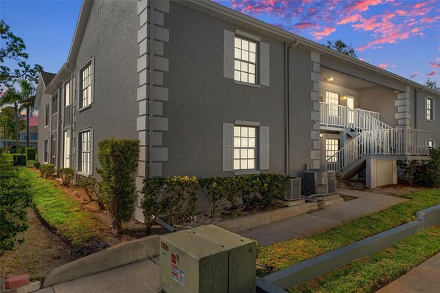 property exterior at dusk with central AC